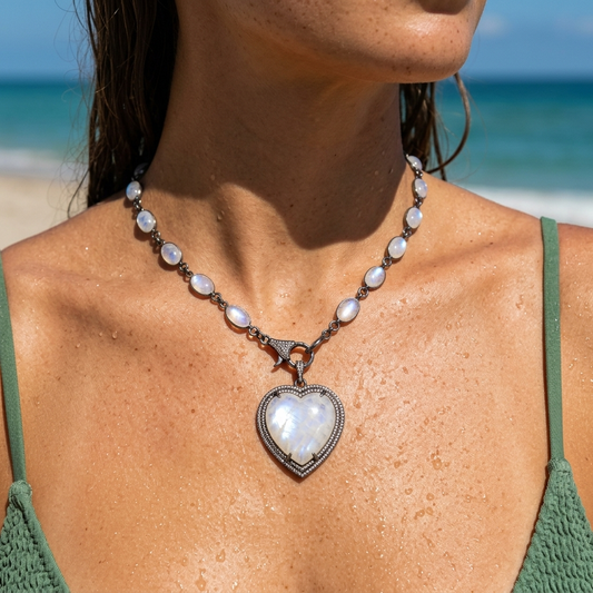 Close-up of moonstone heart pendant framed with genuine diamonds in sterling silver | Bliss by Cori
