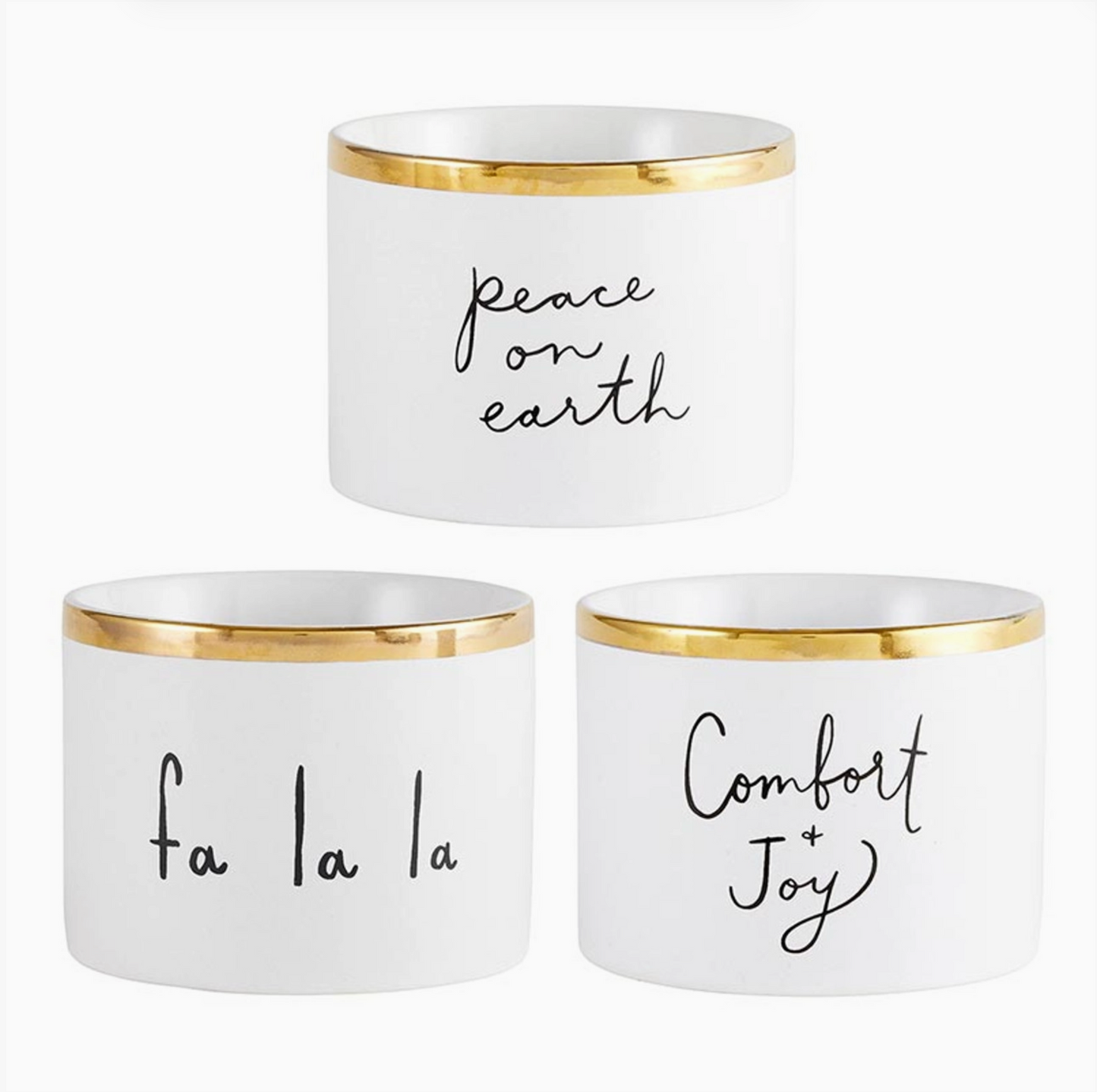 Set of three white ceramic holiday dip bowls with gold foil rims and black script reading Peace on Earth, Fa La La and Comfort + Joy on white background – Bliss by Cori