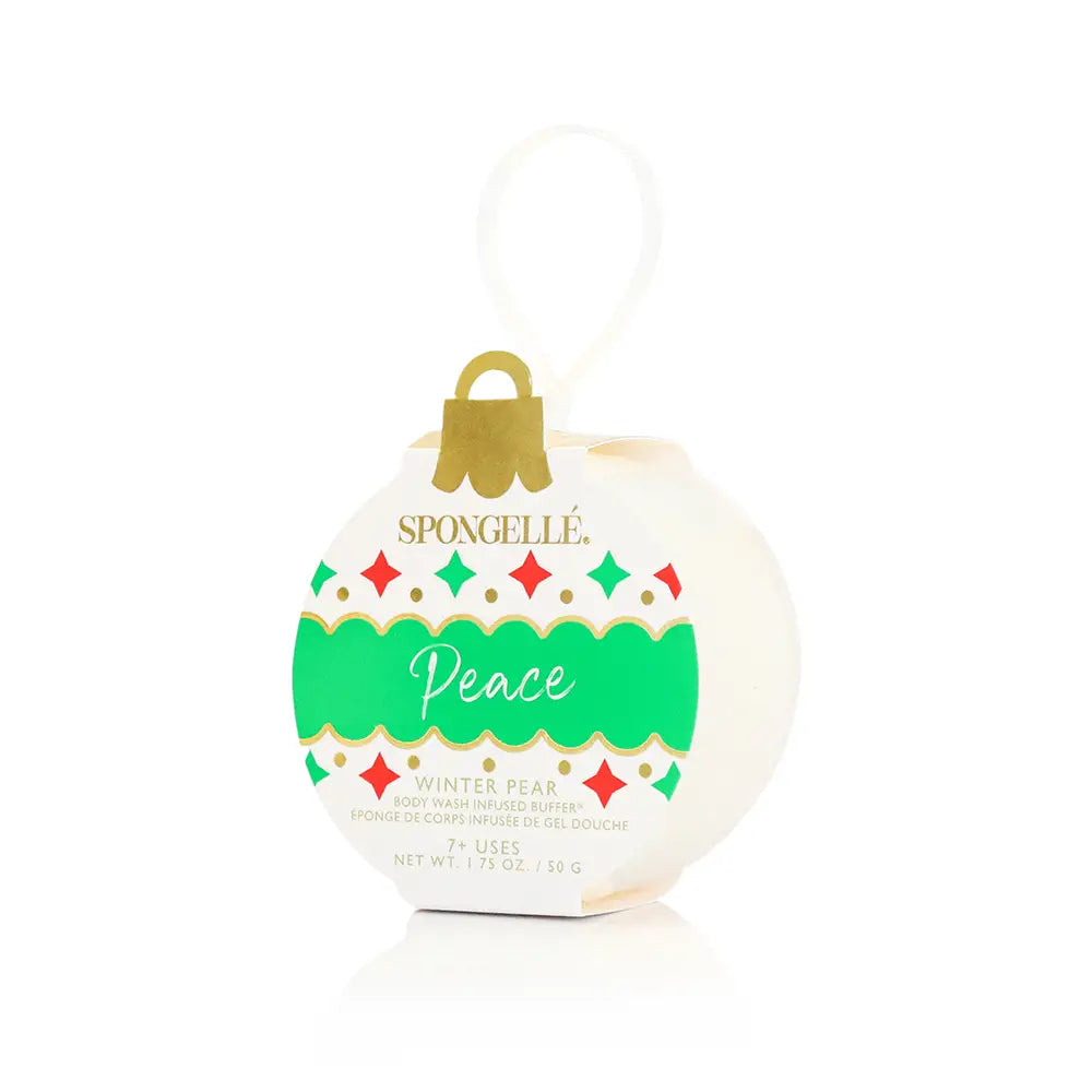 Spongellé Peace Winter Pear body buffer ornament in white and green holiday packaging on white background — Bliss by Cori Boutique