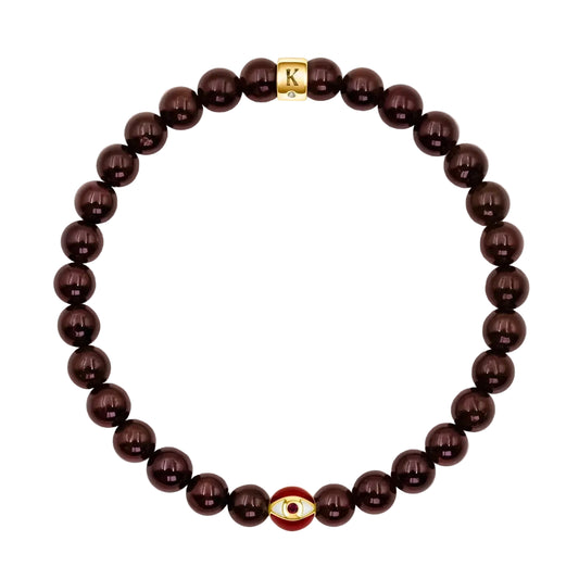 Karma and Luck Endless Passion Garnet January Birthstone Evil Eye Bracelet — polished deep burgundy garnet beads with red enamel evil eye charm and Karma and Luck gold signature clasp | Bliss by Cori