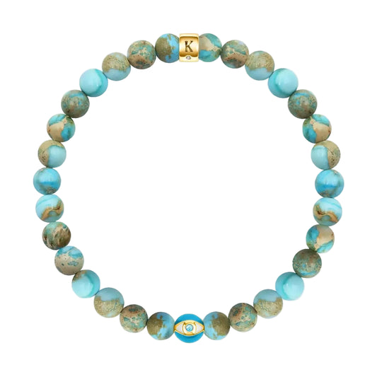 Karma and Luck Divine Healing Turquoise December Birthstone Evil Eye Bracelet — natural turquoise jasper beads in earthy teal and sage tones with teal evil eye charm and Karma and Luck signature clasp | Bliss by Cori
