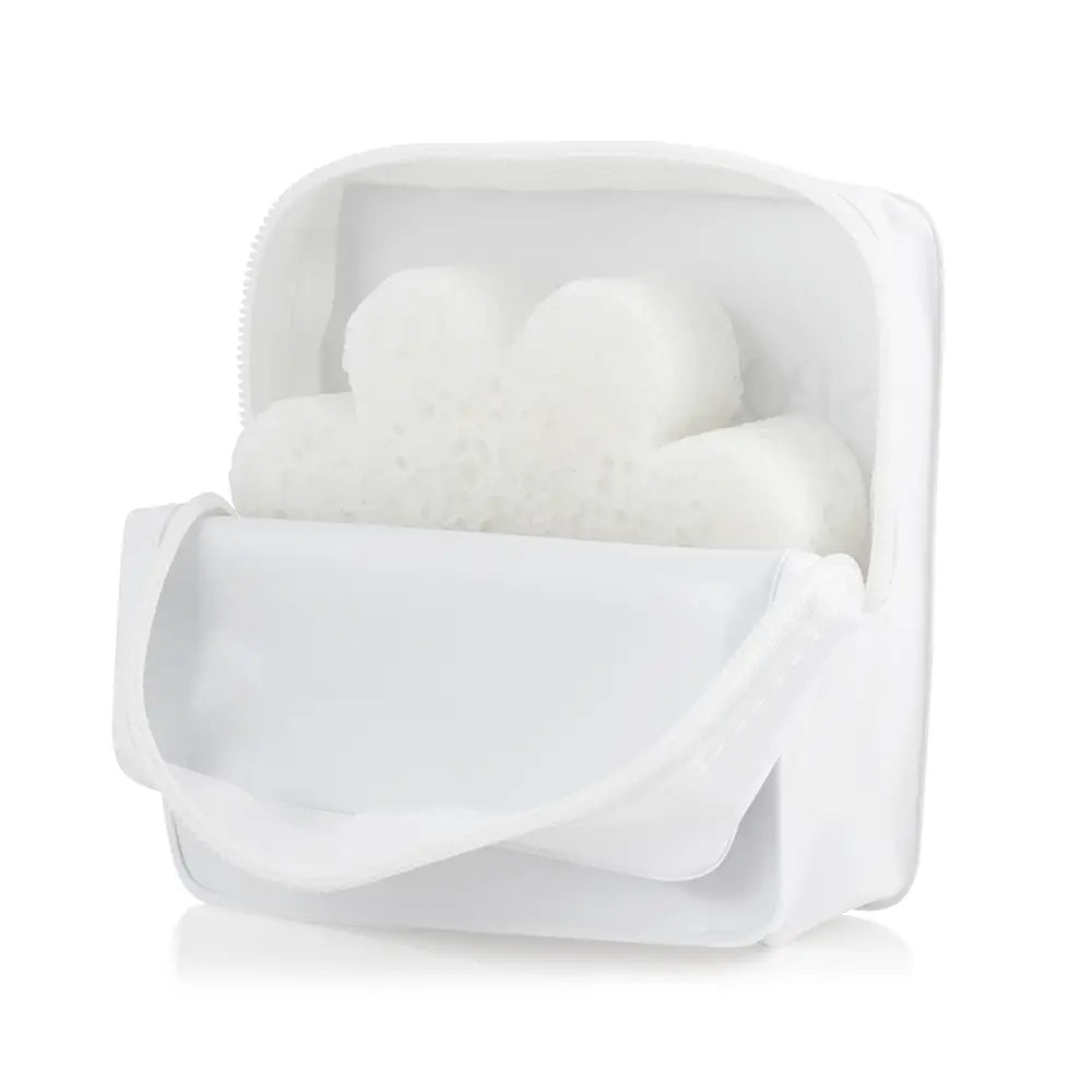 Spongellé white travel case open showing body buffer stored inside on white background — Bliss by Cori Boutique