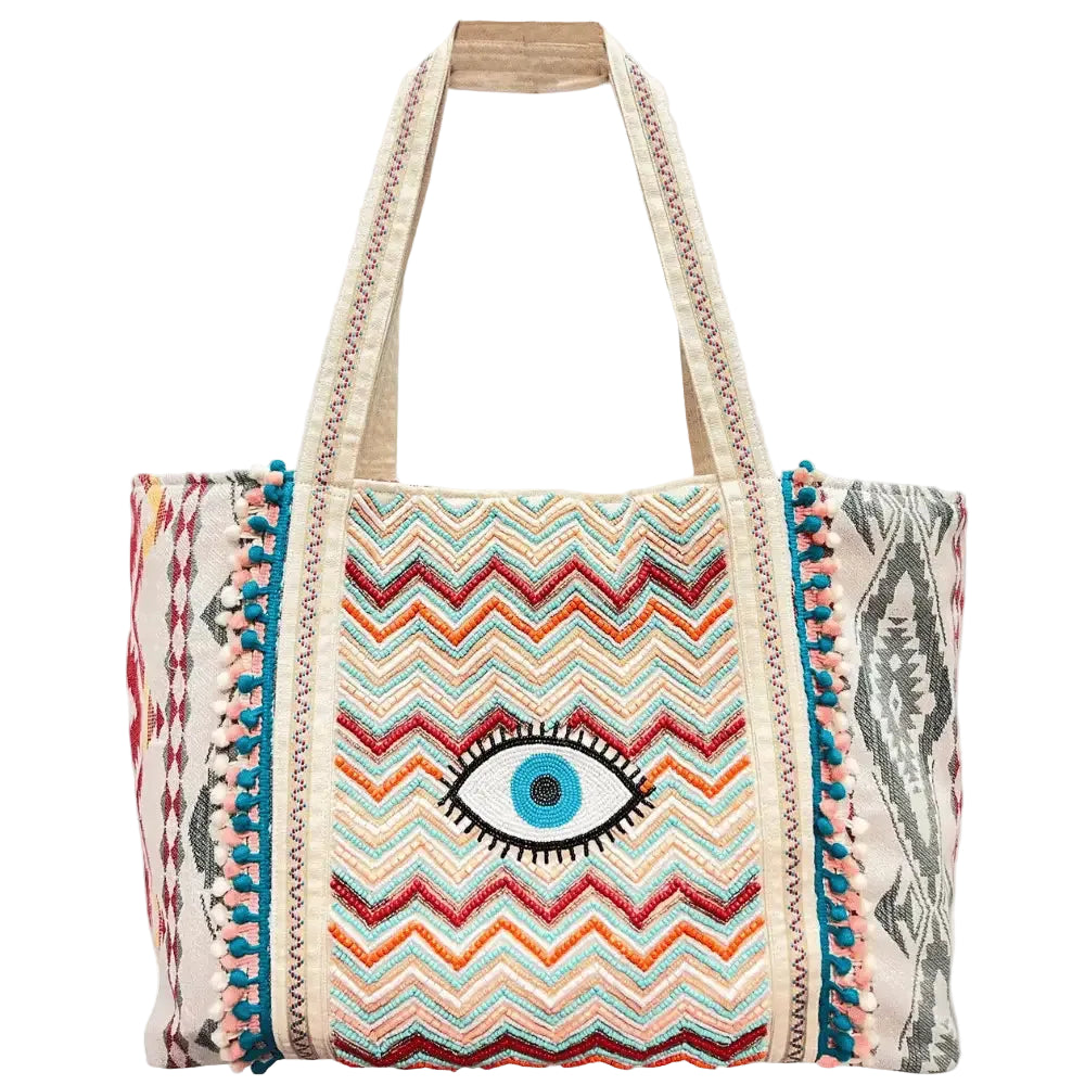 Multicolor chevron embroidered boho tote bag with evil eye detail and pom-pom trim | Bliss by Cori
