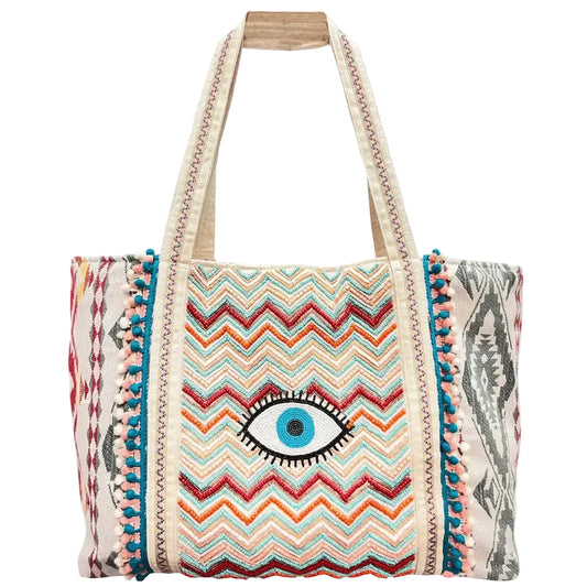 Multicolor chevron embroidered boho tote bag with evil eye detail and pom-pom trim | Bliss by Cori