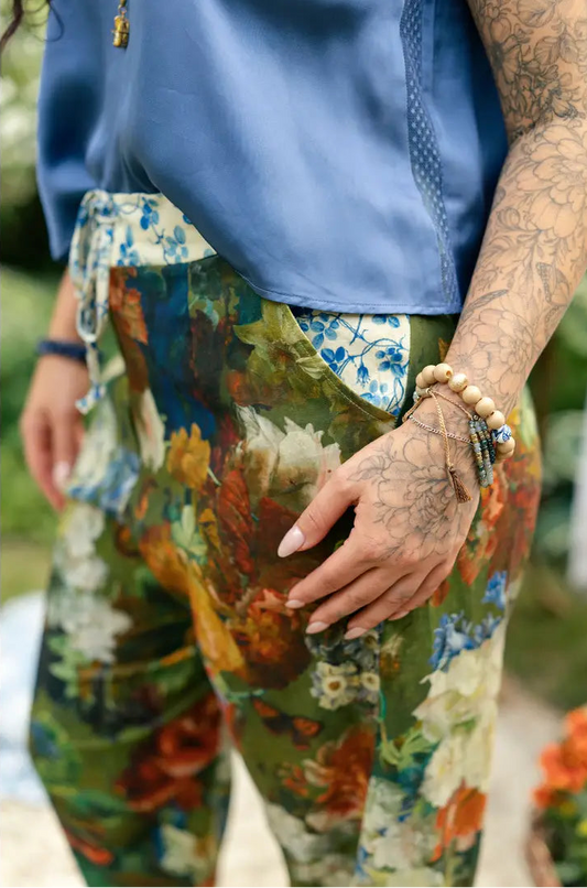 Flora Poetica floral and bird print artist pants shown from the front | Bliss by Cori
