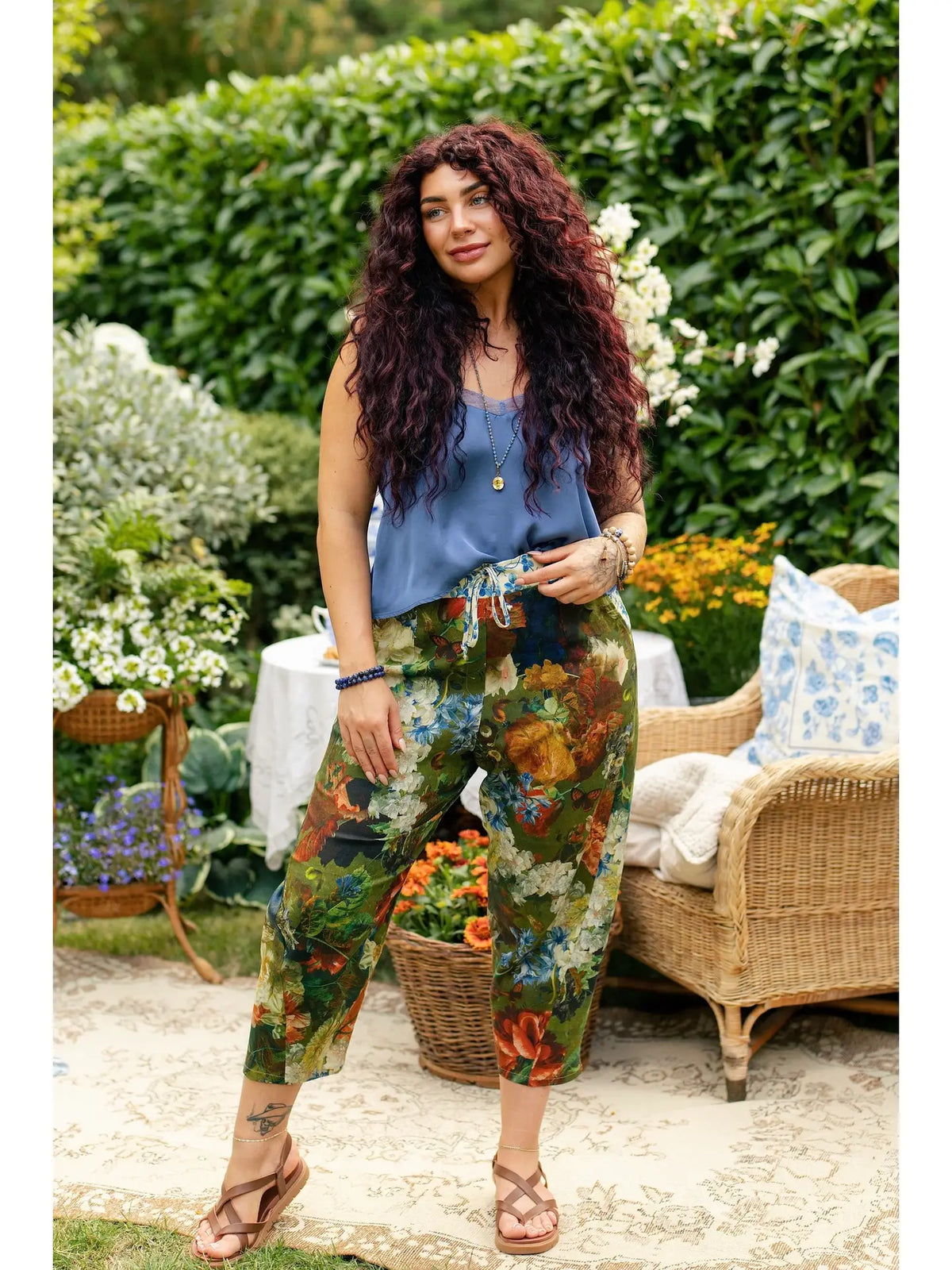 Model wearing Flora Poetica cropped linen-blend pants with floral and bird print | Bliss by Cori