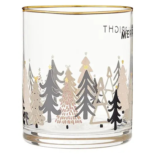 Angled view of Merry & Bright holiday rocks glass with gold rim and festive Christmas tree pattern in gray, blush and gold – Bliss by Cori
