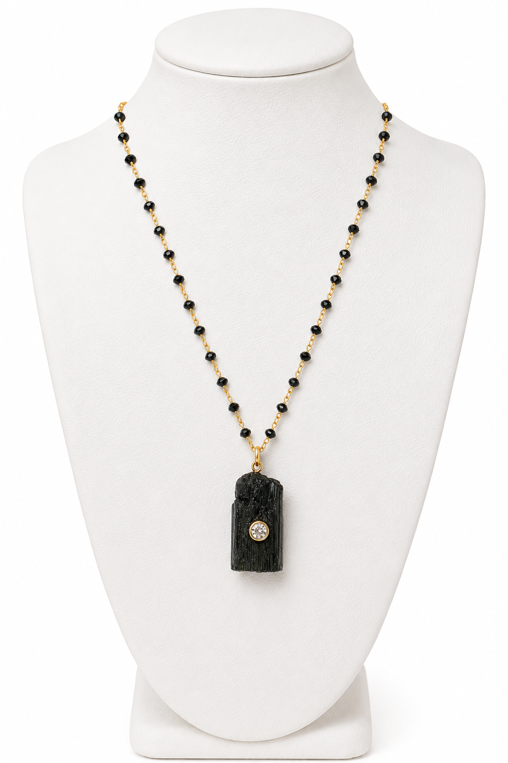Midnight Guardian Raw Black Tourmaline Necklace on jewelry display – faceted black bead chain with raw crystal pendant and clear crystal accent – Bliss by Cori