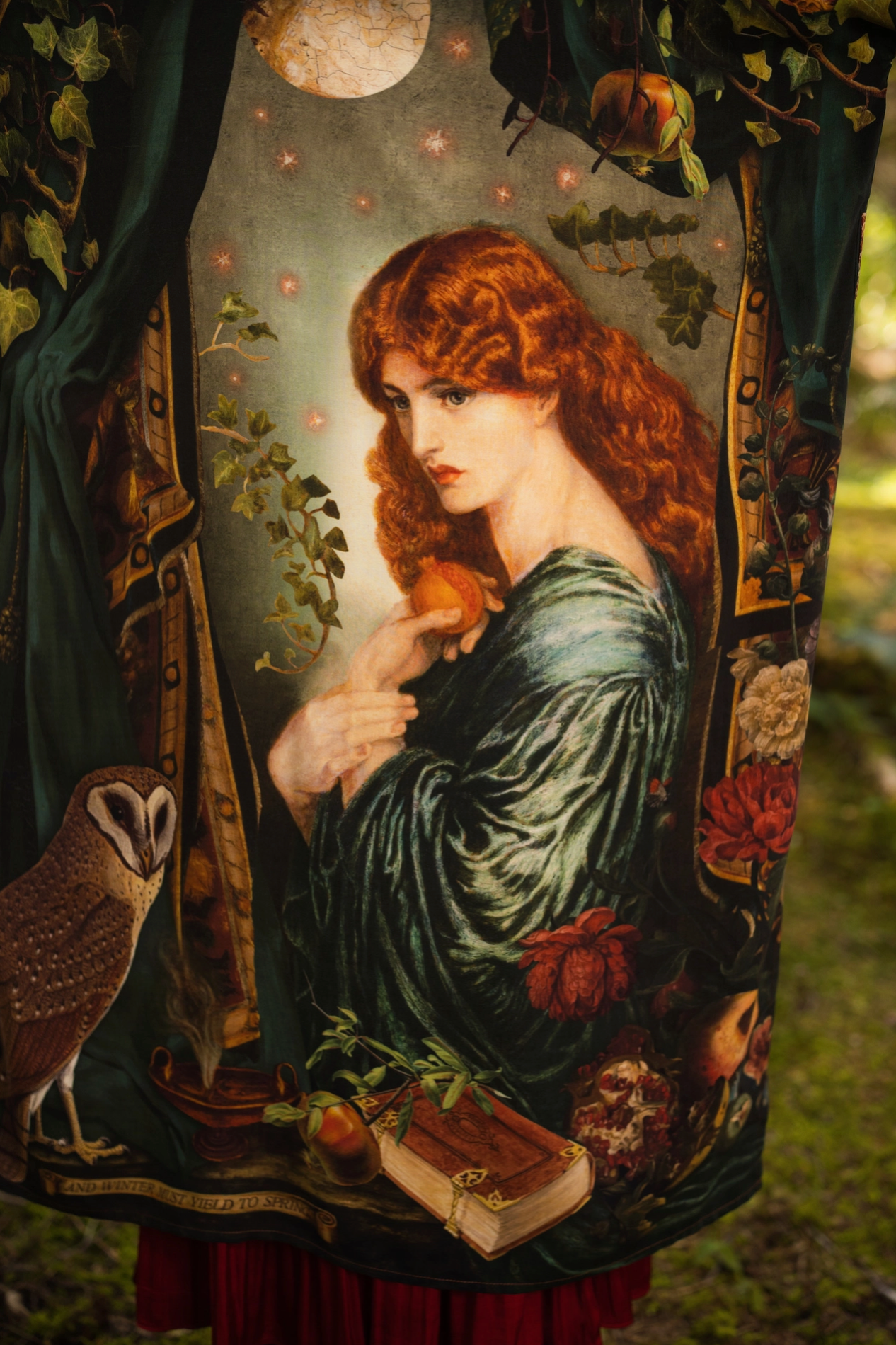Close-up of Solstice Opera Duster Kimono front panel showing owl illustration and botanical pomegranate print detail on dark green viscose fabric — Bliss by Cori