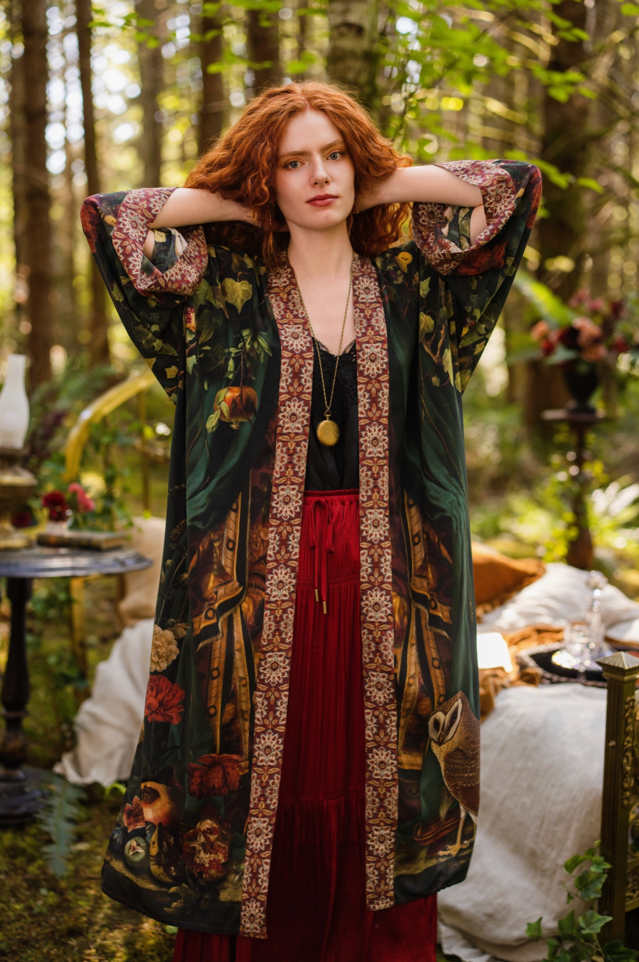 Close-up detail of Solstice Opera Duster Kimono showing pomegranate, roses and symbolic antique book print elements on dark green viscose — Bliss by Cori