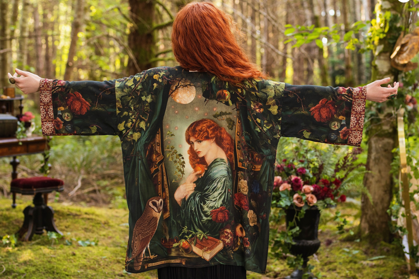 Close-up of Solstice Matinée Mid-Length Duster Kimono showing barn owl illustration and botanical print on dark green viscose with tapestry-inspired cuff trim — Bliss by Cori