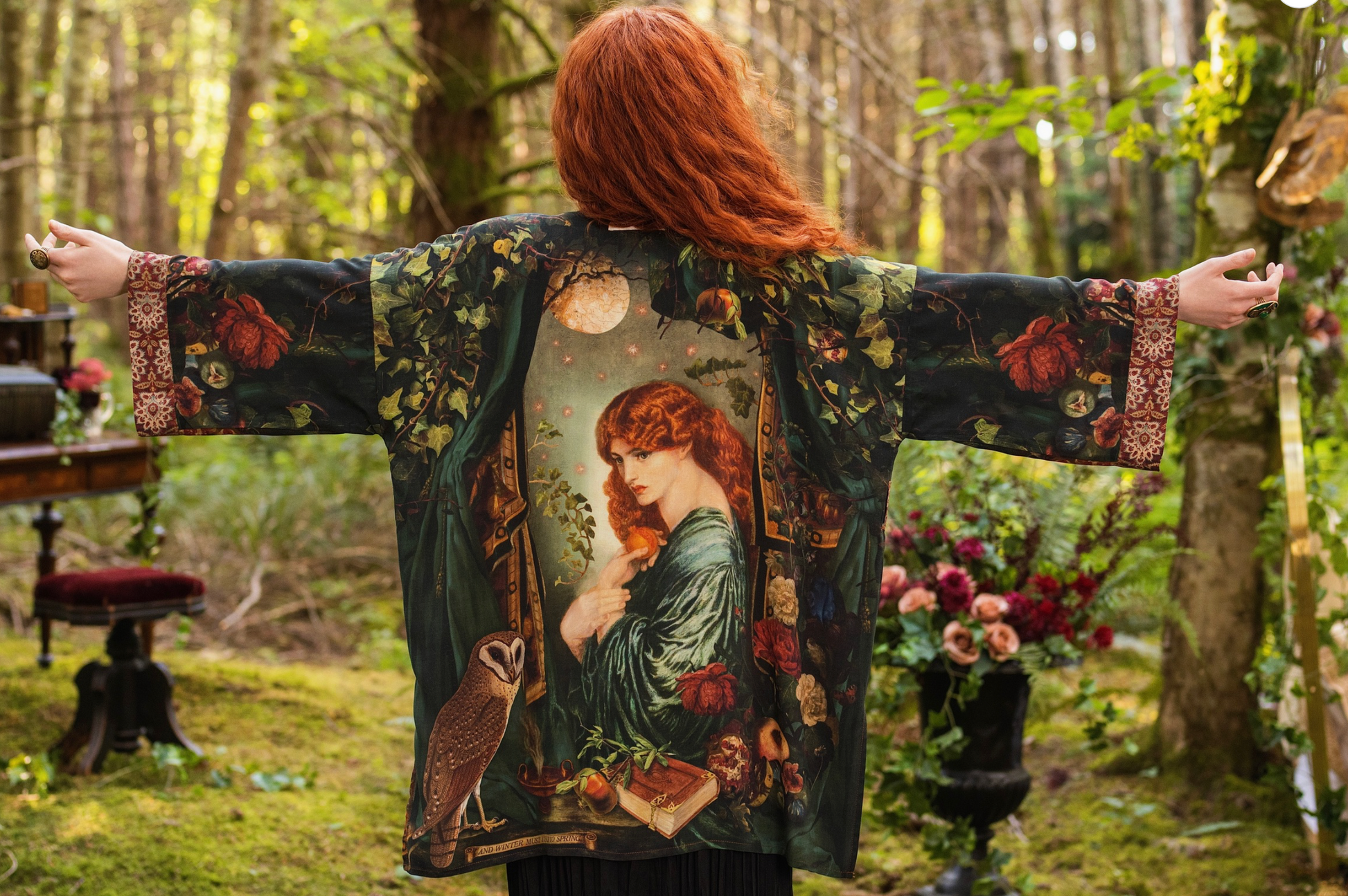 Close-up of Solstice Matinée Mid-Length Duster Kimono showing barn owl illustration and botanical print on dark green viscose with tapestry-inspired cuff trim — Bliss by Cori