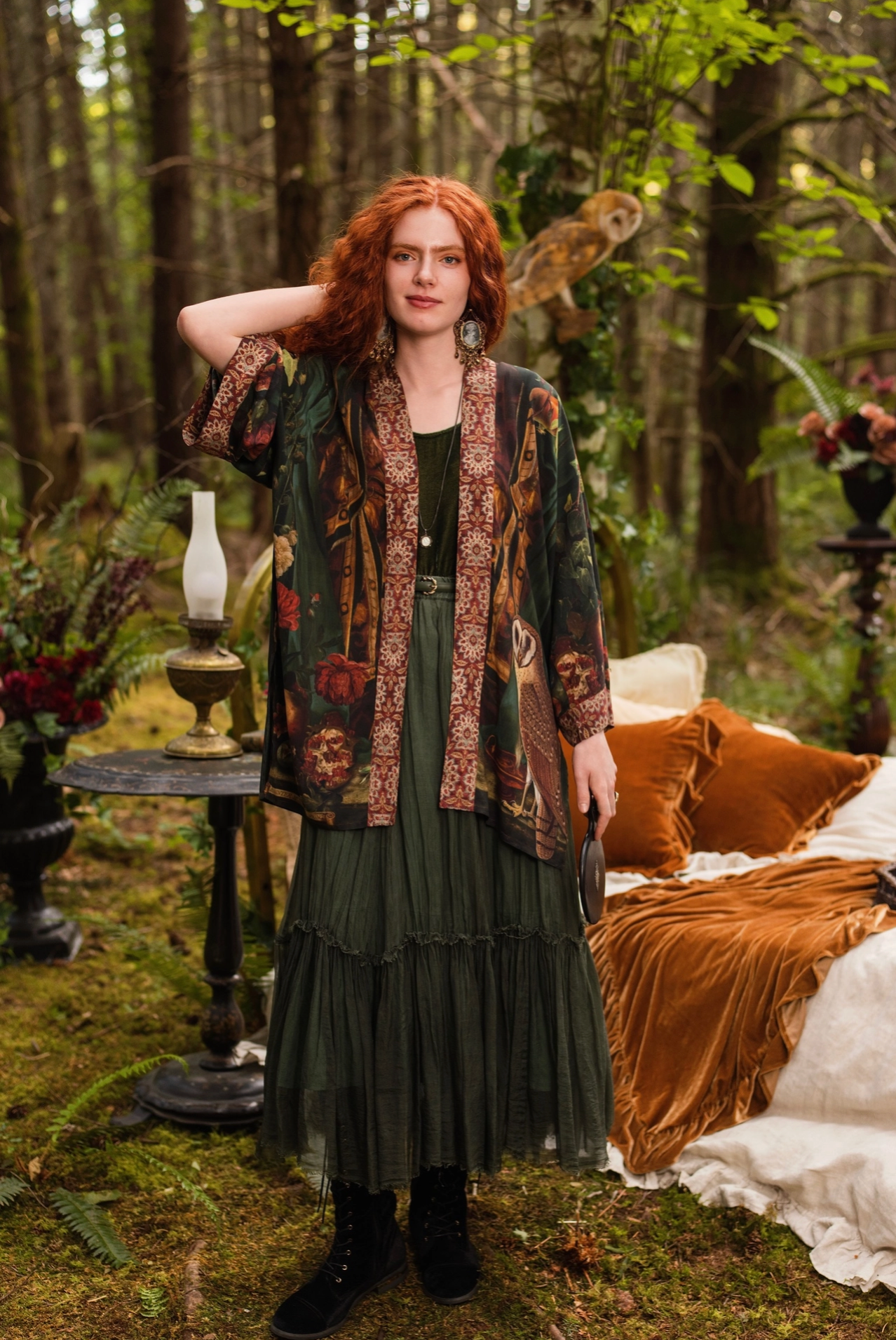Detail of Solstice Matinée Mid-Length Duster Kimono showing pomegranate, roses and symbolic hourglass print on dark green viscose with ornate tapestry border — Bliss by Cori