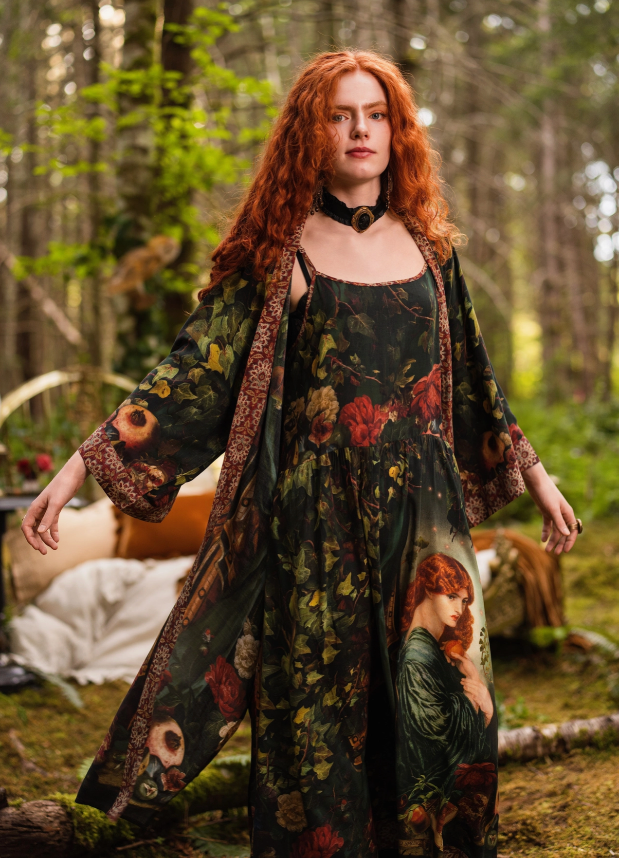 Close-up of Solstice Bohéme Maxi Slip Dress showing barn owl illustration and pomegranate print detail on deep forest green viscose with tapestry hem border — Bliss by Cori