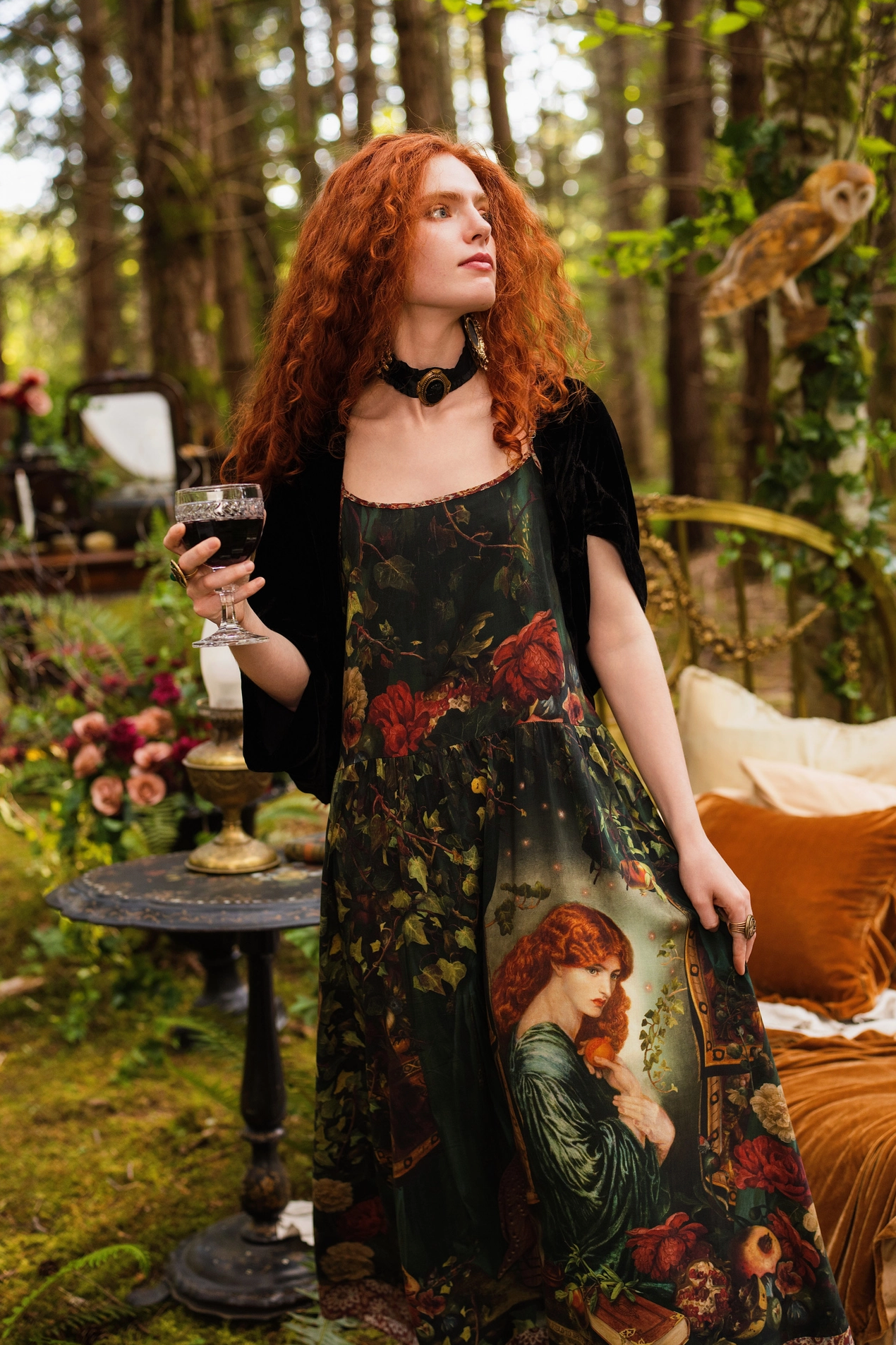 Detail shot of Solstice Bohéme Maxi Slip Dress hem showing ornate tapestry border trim with warm terracotta mandala print at the base of deep green viscose — Bliss by Cori