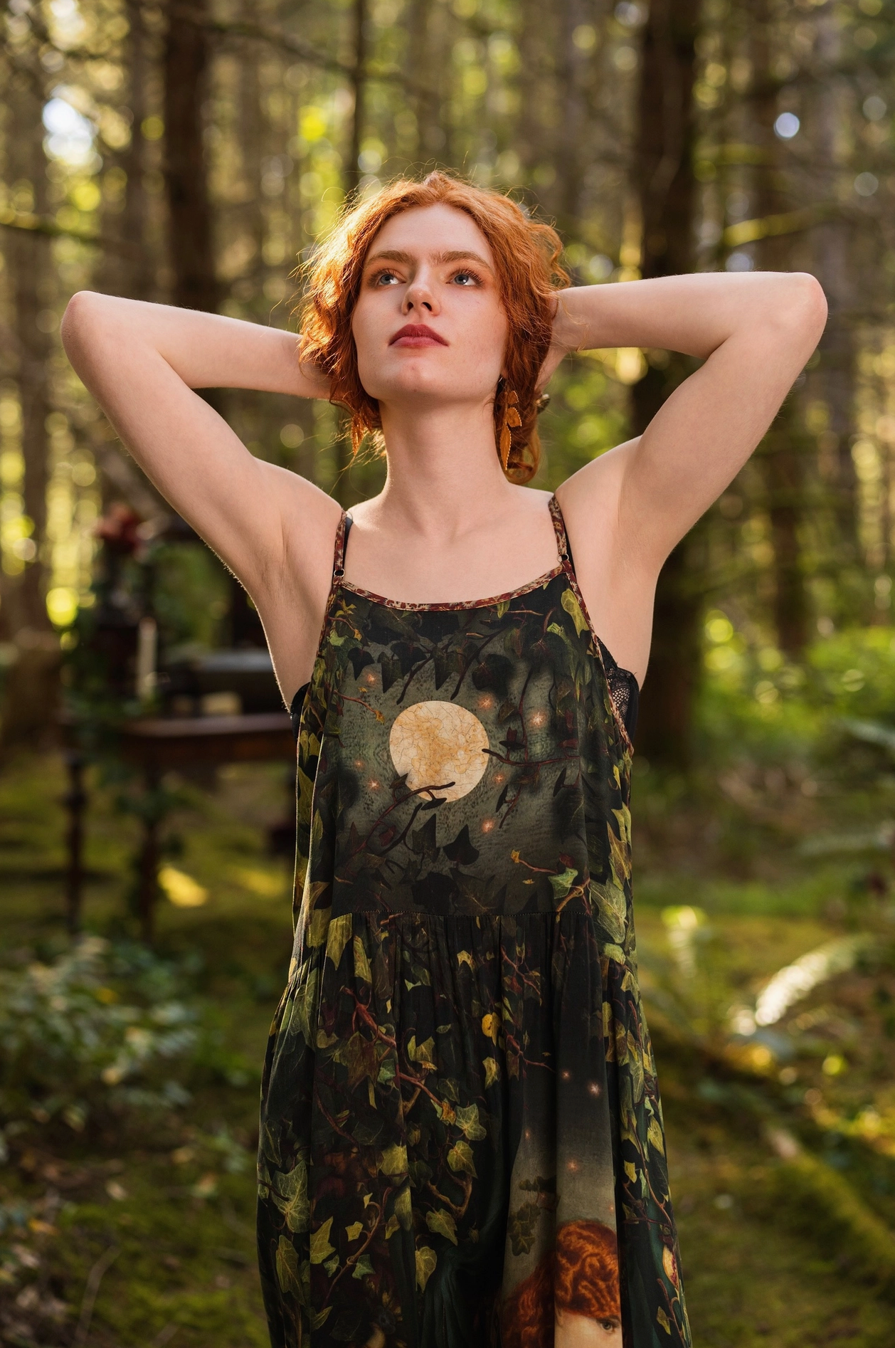 Close-up of Solstice Bohéme Maxi Slip Dress neckline and upper bodice showing moon and ivy print on dark green viscose with delicate lace trim — Bliss by Cori