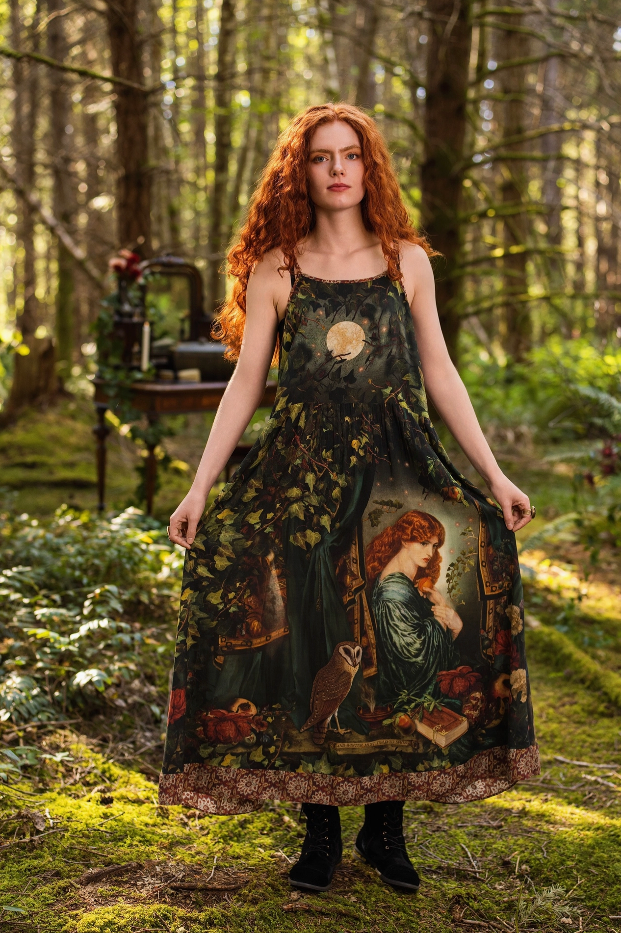 Close-up of Solstice Bohéme Maxi Slip Dress showing moon, ivy and botanical print on dark green viscose with tapestry border hem and lace trim neckline — Bliss by Cori