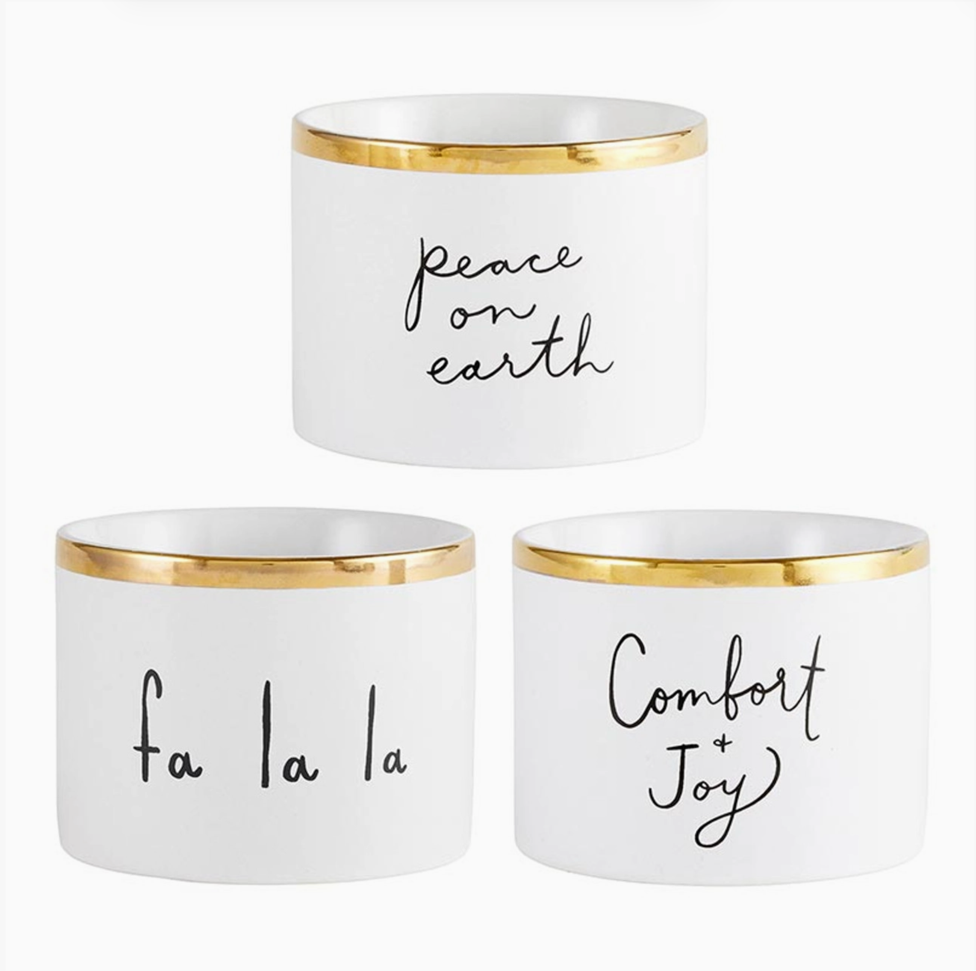 Set of three white ceramic holiday dip bowls with gold foil rims and black script reading Peace on Earth, Fa La La and Comfort + Joy on white background – Bliss by Cori
