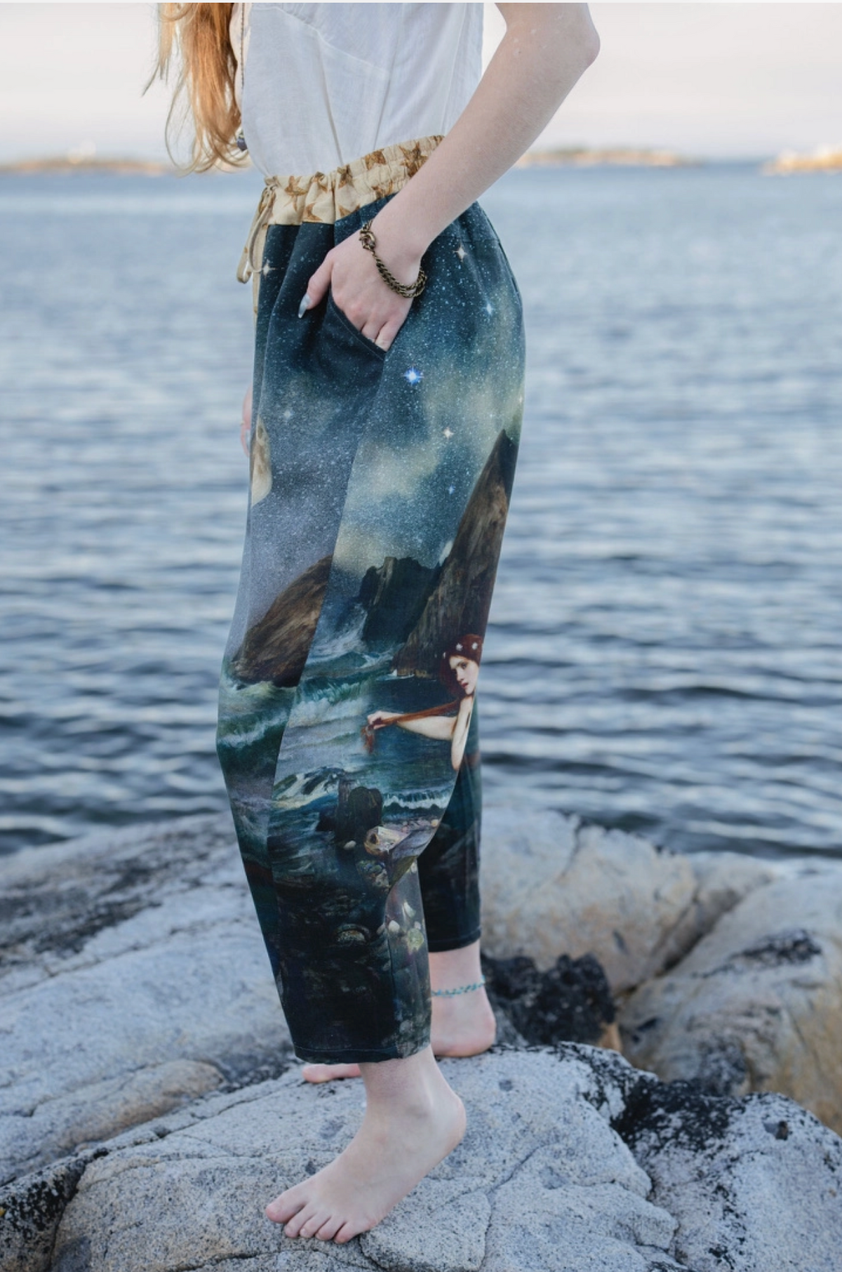 Close-up of the Waterhouse mermaid artwork on the leg of the Siren Artist Pants | Bliss by Cori