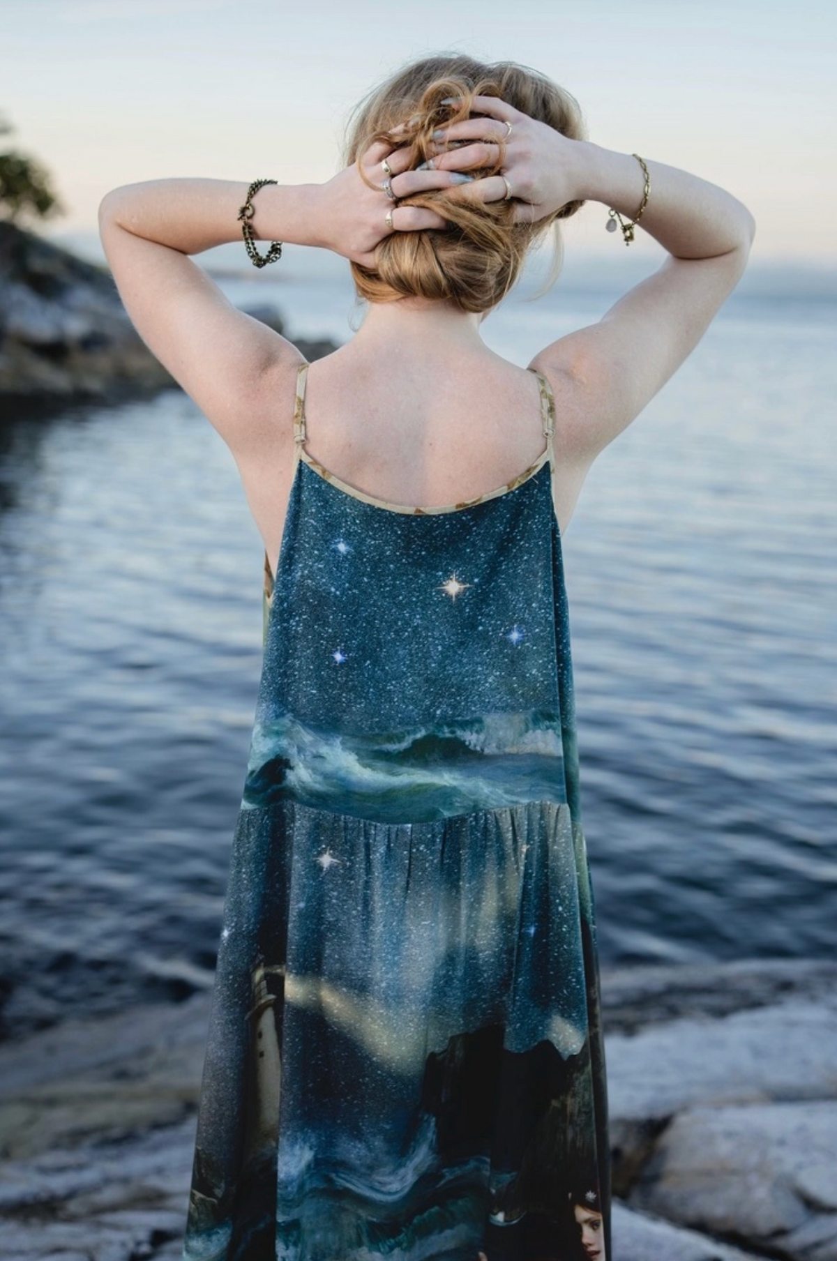 Full back view of the Market of Stars Siren maxi dress on a rocky shoreline | Bliss by Cori