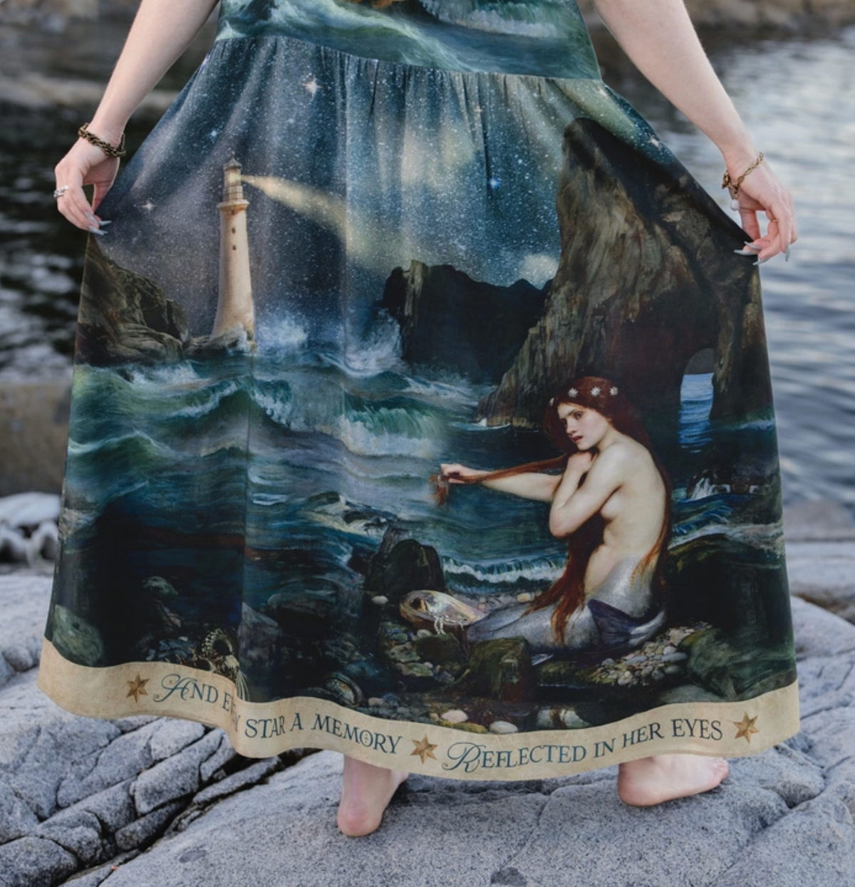 Close-up of the Waterhouse mermaid and ocean artwork near the hem of the Siren maxi dress | Bliss by Cori