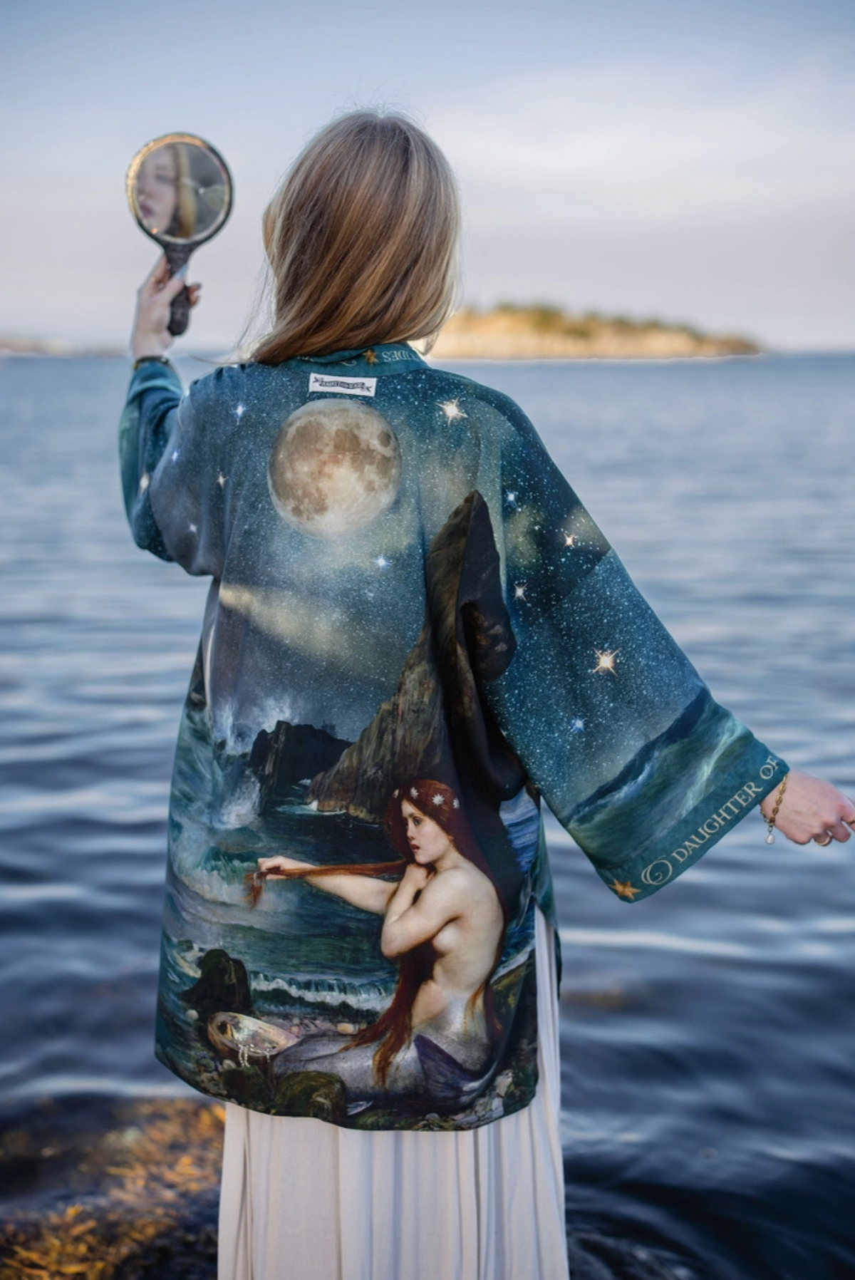 Back shoreline view of the Siren Matinée Duster with moon, stars and mermaid artwork | Bliss by Cori