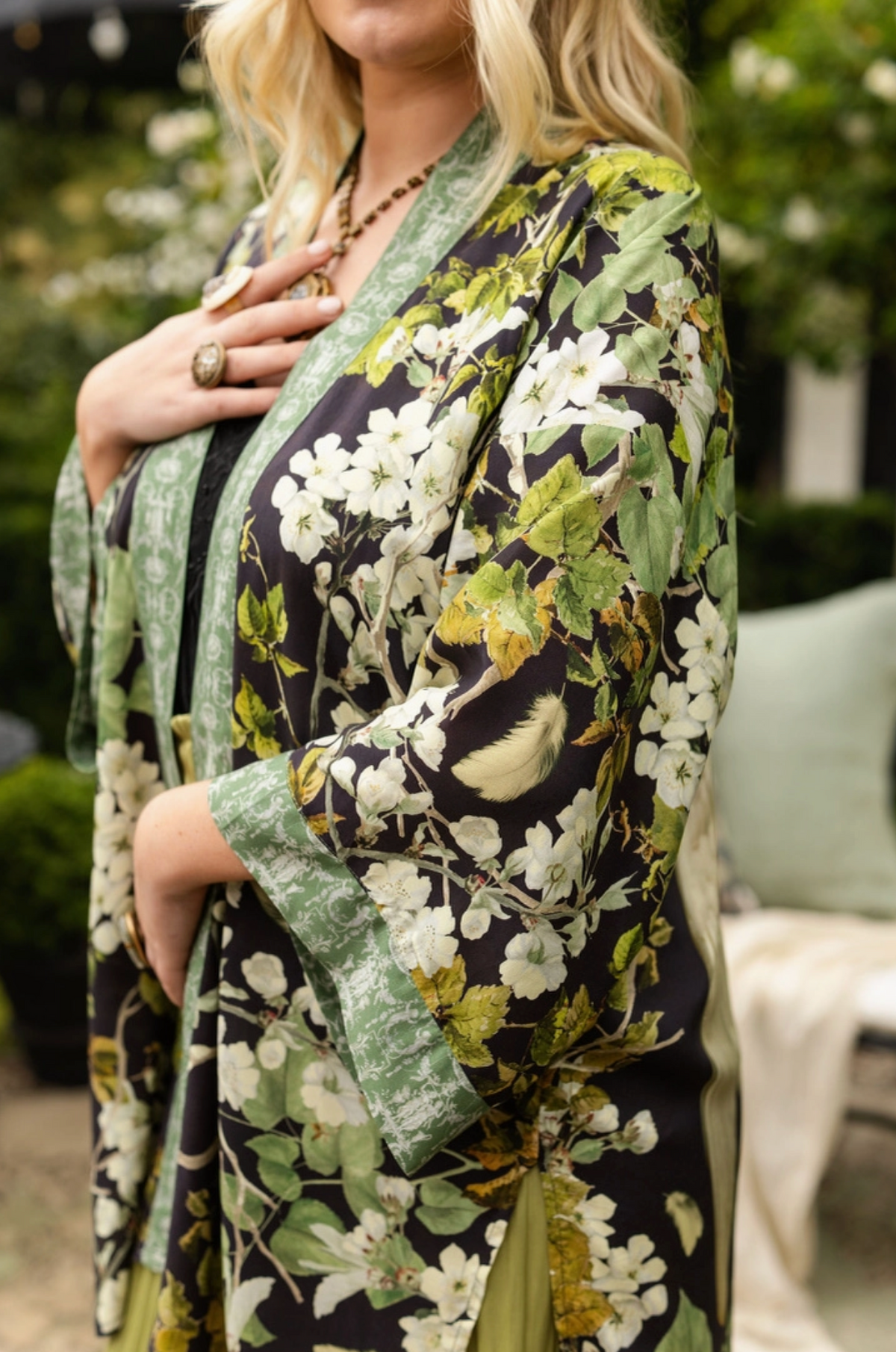 Close-up of the Equinox duster front with apple blossoms, leafy botanicals and green trim | Bliss by Cori