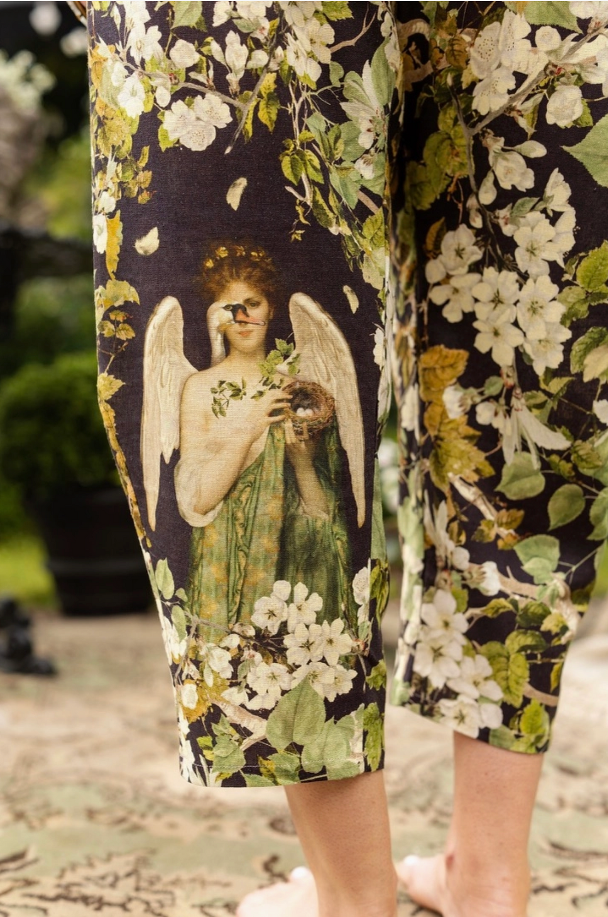 Close-up of the Pandora, swan and antique botanical artwork on the Equinox Artist Pants | Bliss by Cori