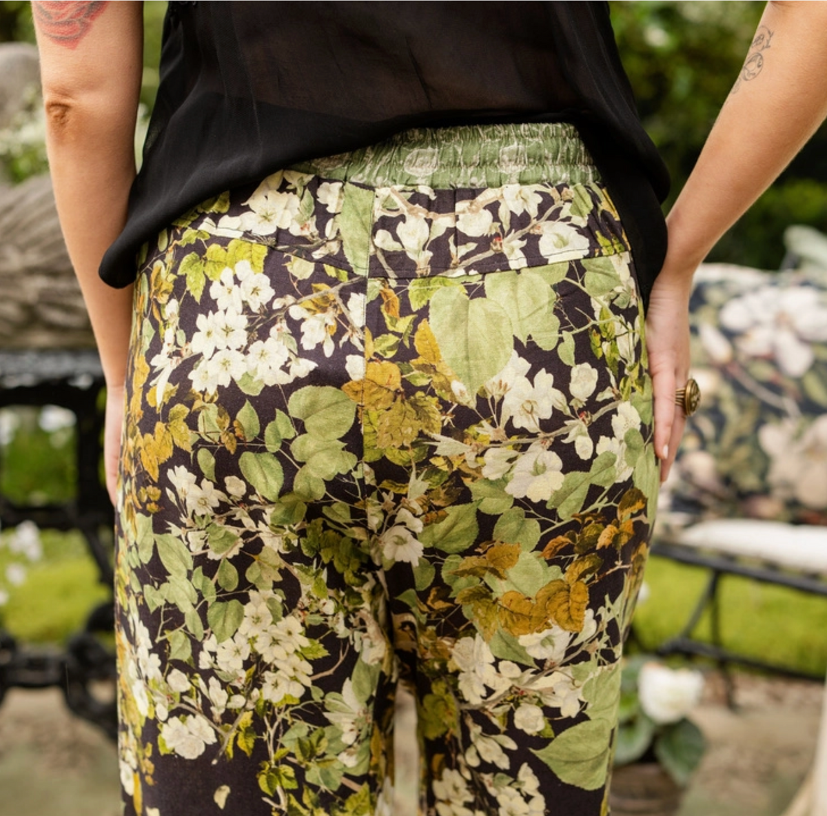 Back close-up of the Equinox Artist Pants showing the swan, blossoms and botanical print | Bliss by Cori