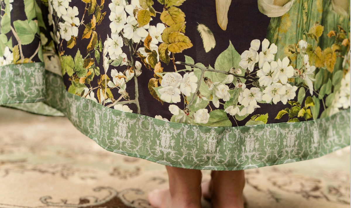 Hem detail of the Equinox dress with white blossoms, green trim and antique botanical print | Bliss by Cori