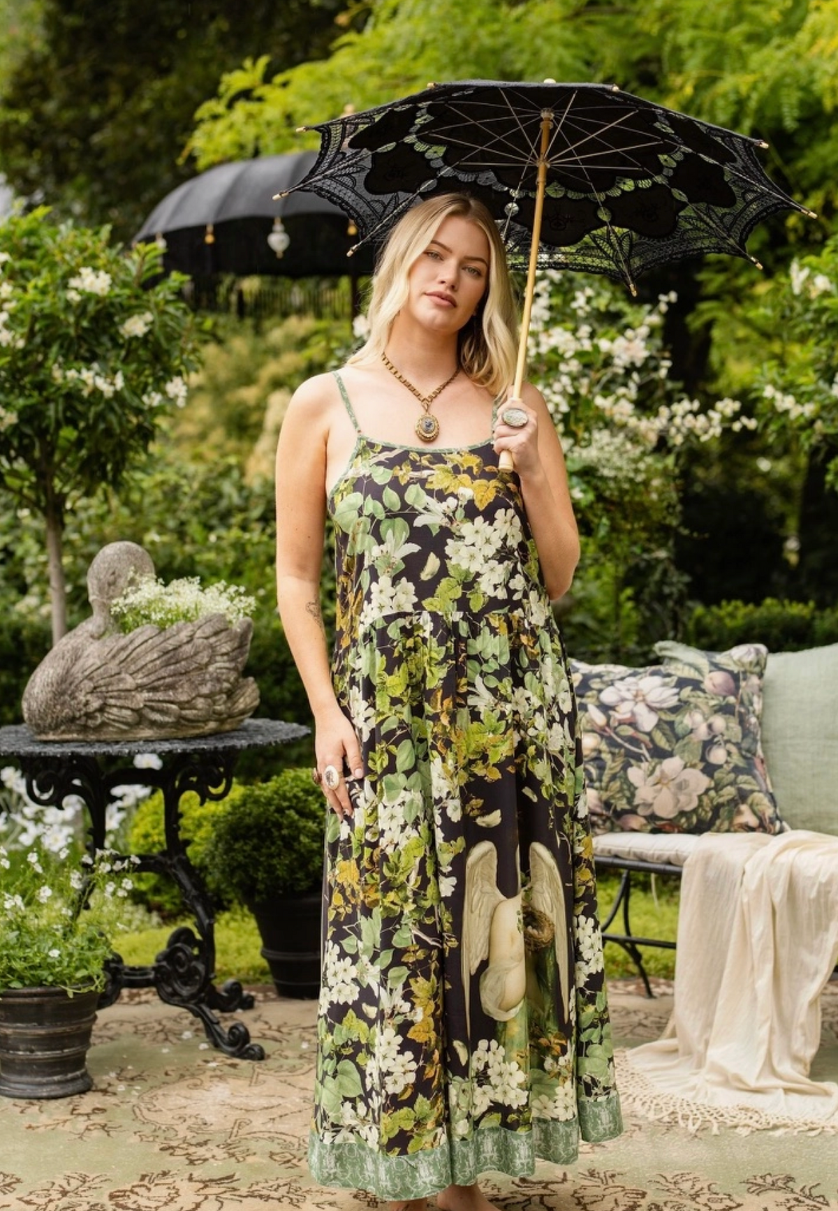 Front view of the Equinox Bohème maxi slip dress styled with a black parasol | Bliss by Cori