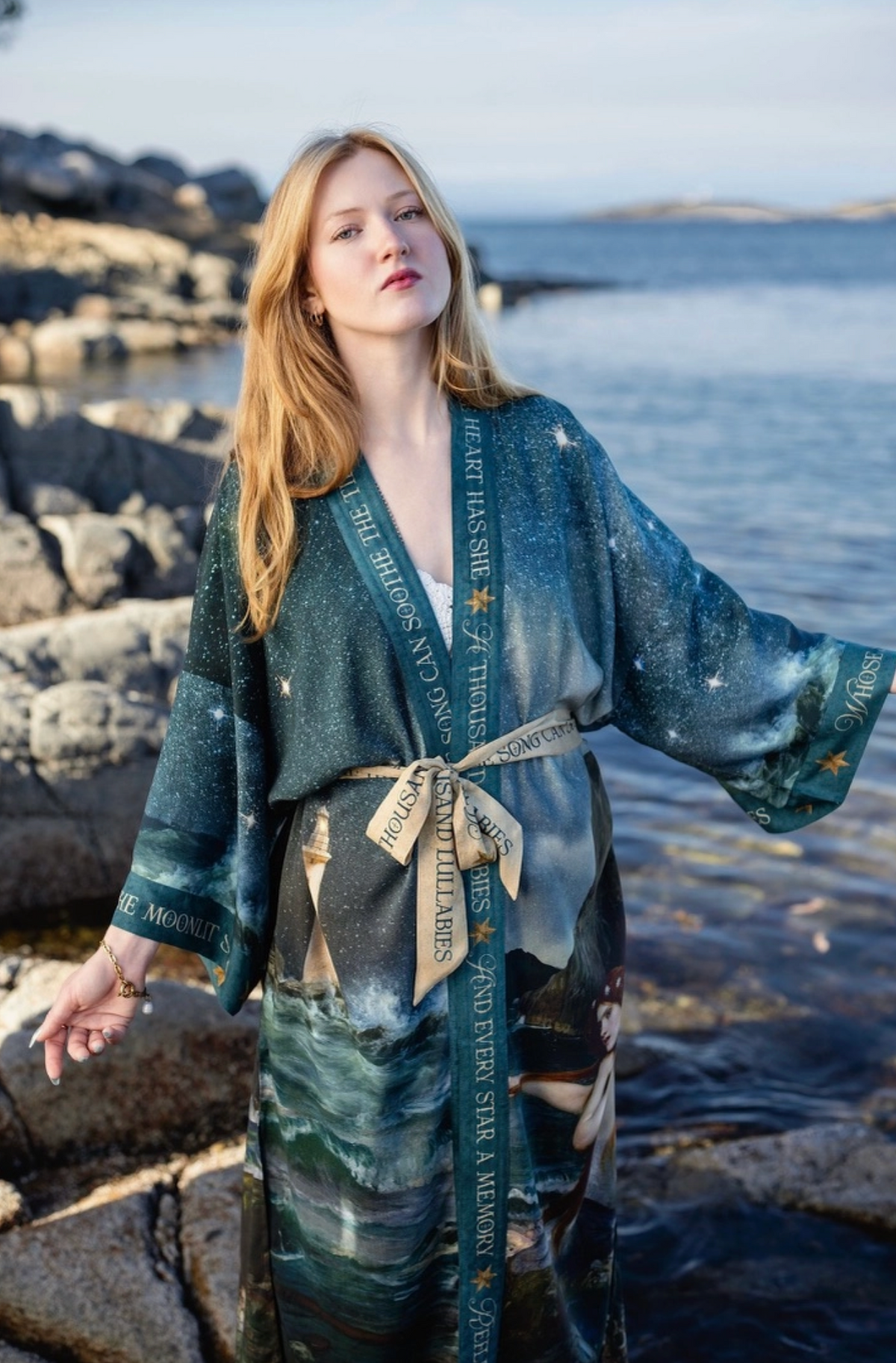 Front view of the Siren opera duster styled open over a dark dress by the water | Bliss by Cori