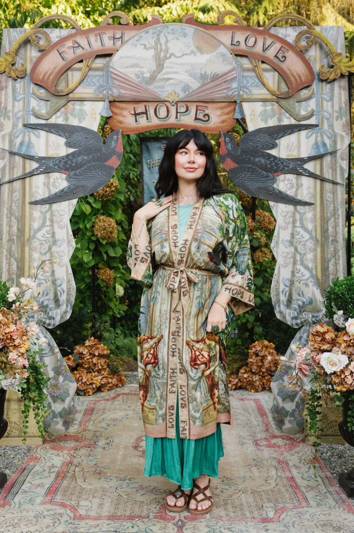 Model wearing Book of Love opera duster tied at the waist over a turquoise maxi dress | Bliss by Cori
