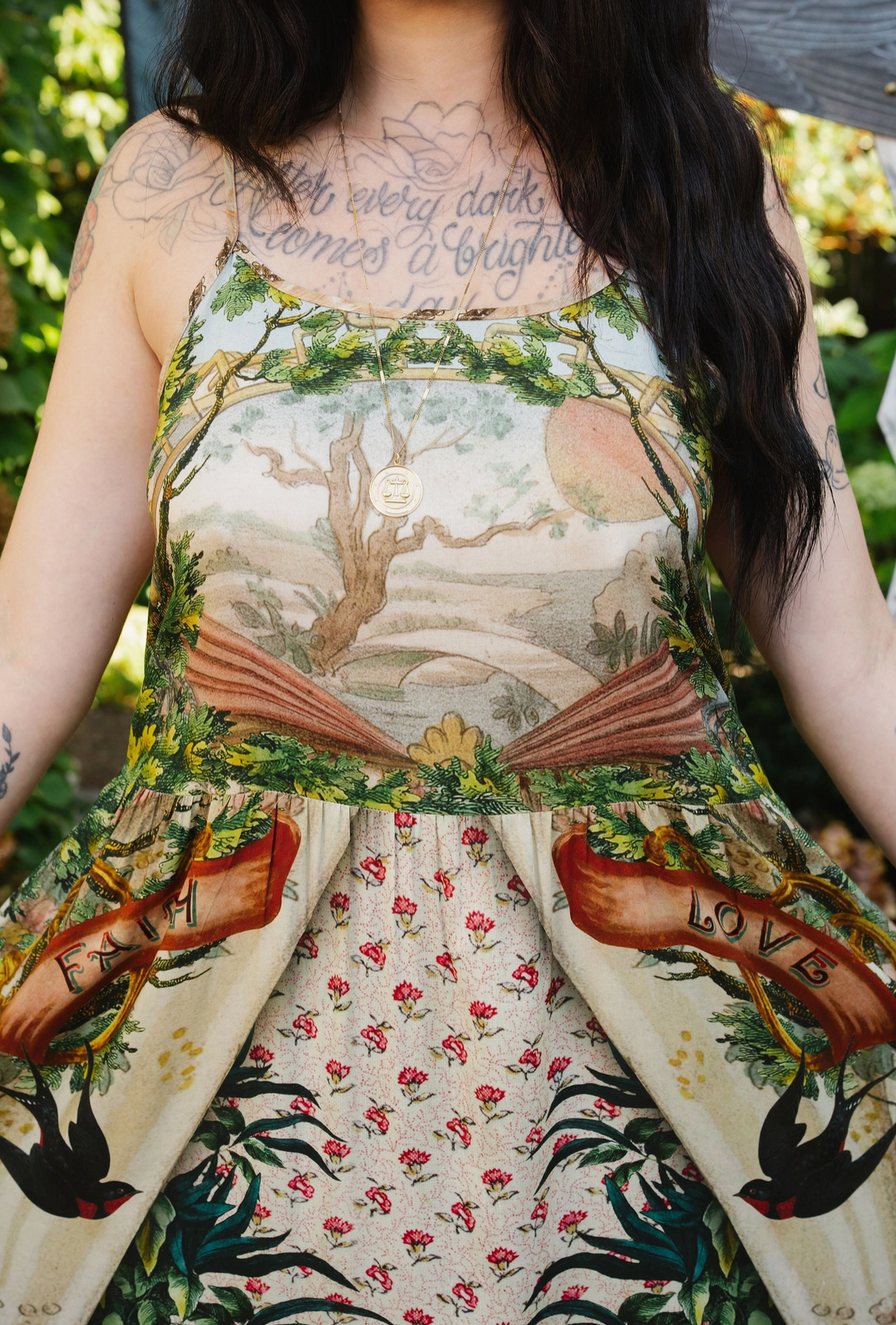 Book of Love slip dress close-up showing a tree landscape bodice, delicate straps, and floral skirt | Bliss by Cori