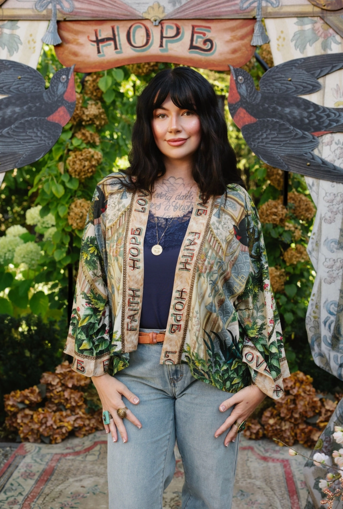 Front view of Book of Love cropped kimono styled with a navy top and light blue jeans | Bliss by Cori