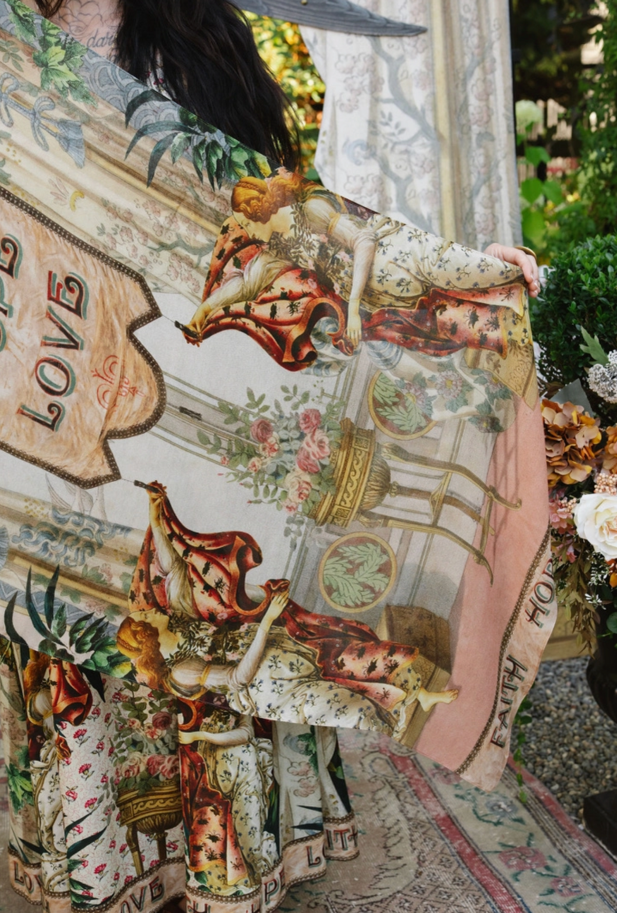 Book of Love scarf detail showing vintage figures, floral artwork, a pink border, and Faith Hope Love lettering | Bliss by Cori