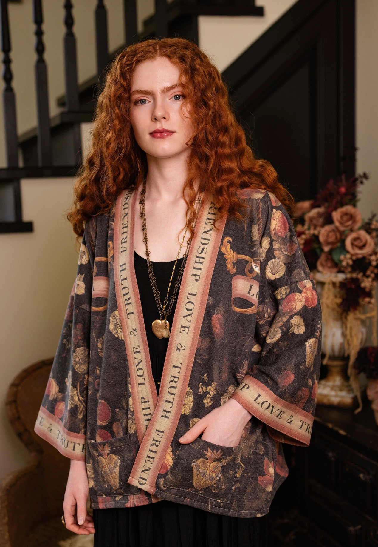 Side view of model wearing Heart of Gold Cottage Jacket on staircase | Bliss by Cori