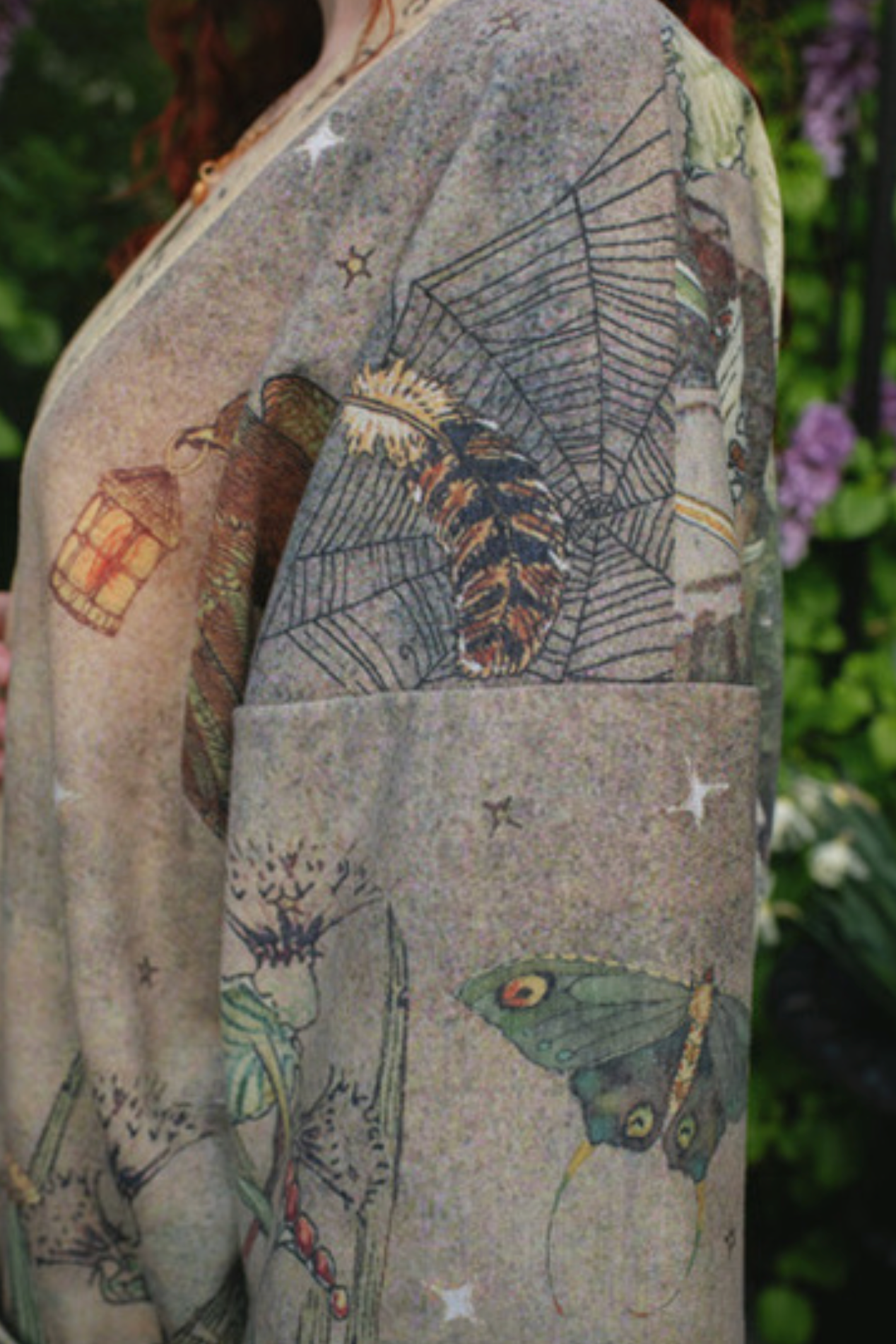 Side sleeve detail of Lovelight Cottage Jacket showing spiderweb and moth watercolour print | Bliss by Cori