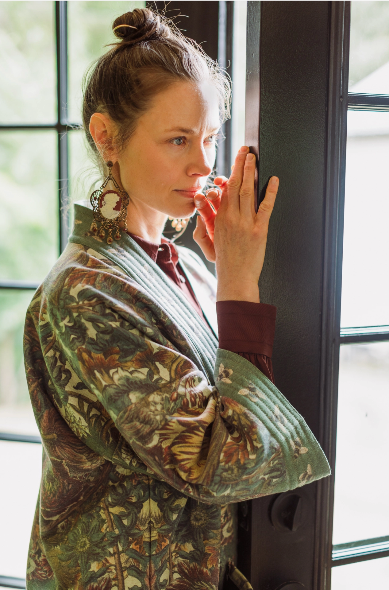 Model seated wearing Love Grows Wild Cottage Jacket in botanical garden room | Bliss by Cori