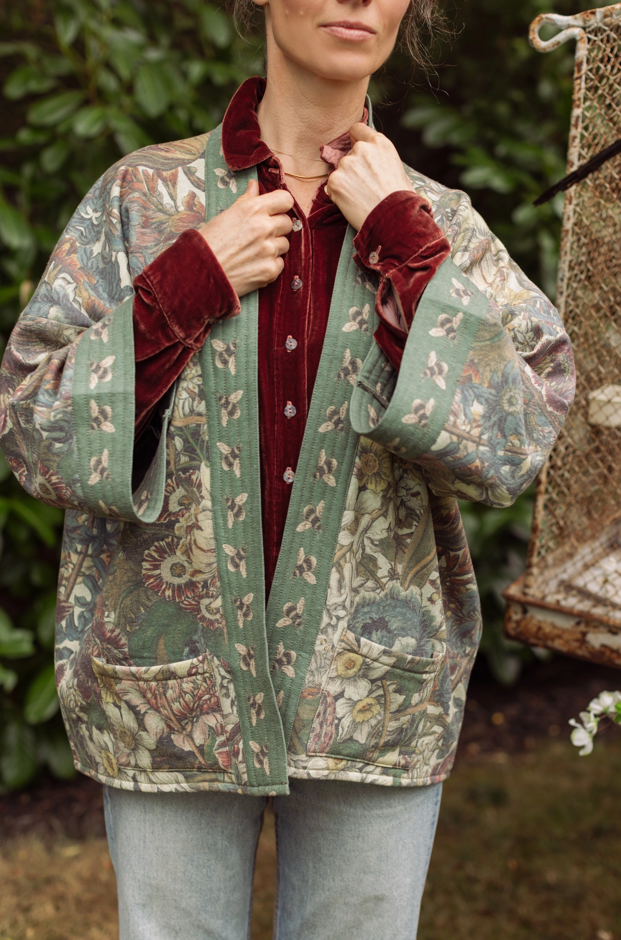 Model wearing Love Grows Wild Cottage Jacket outdoors with magpie on branch | Bliss by Cori
