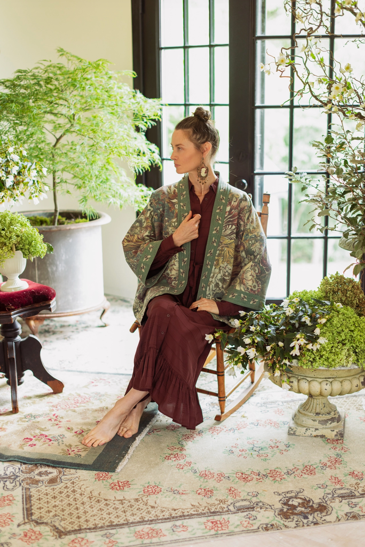 Side profile of model wearing Love Grows Wild Cottage Jacket at window with cameo earrings | Bliss by Cori