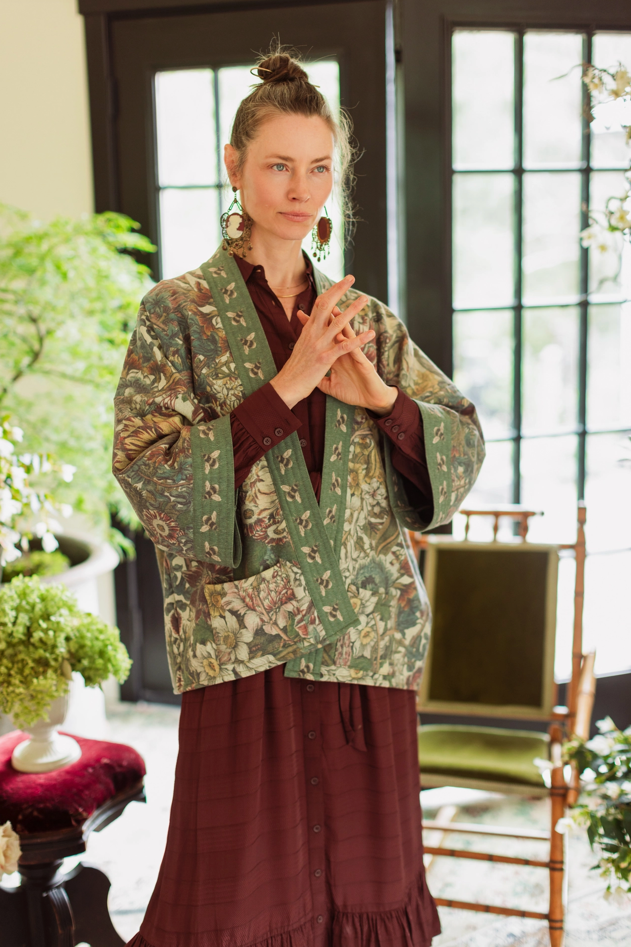 Front detail of Love Grows Wild Cottage Jacket showing quilted floral print and velvet cuffs | Bliss by Cori