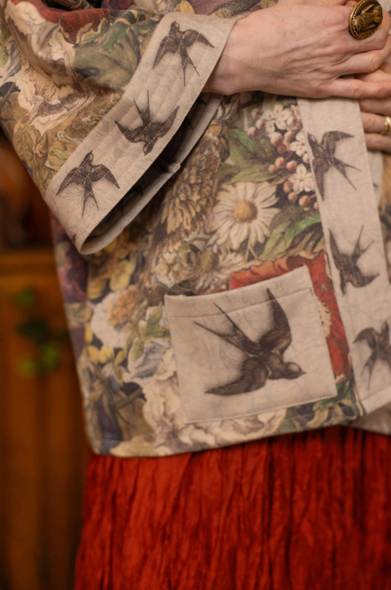 Golden Hour Cottage Jacket flat lay showing full autumn floral and swallow print detail | Bliss by Cori