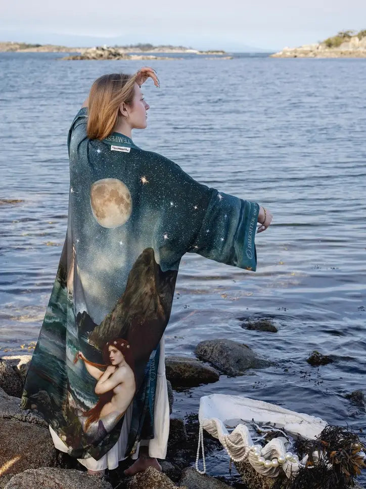 Rear shoreline view of the Siren duster showing its flowing sleeves and moonlit celestial print | Bliss by Cori