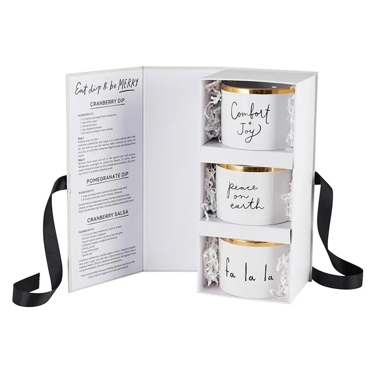 Angled view of Eat Dip & Be Merry holiday dip bowl keepsake book box open showing three gold rim ceramic bowls with Comfort + Joy, Peace on Earth and Fa La La script beside holiday dip recipes – Bliss by Cori
