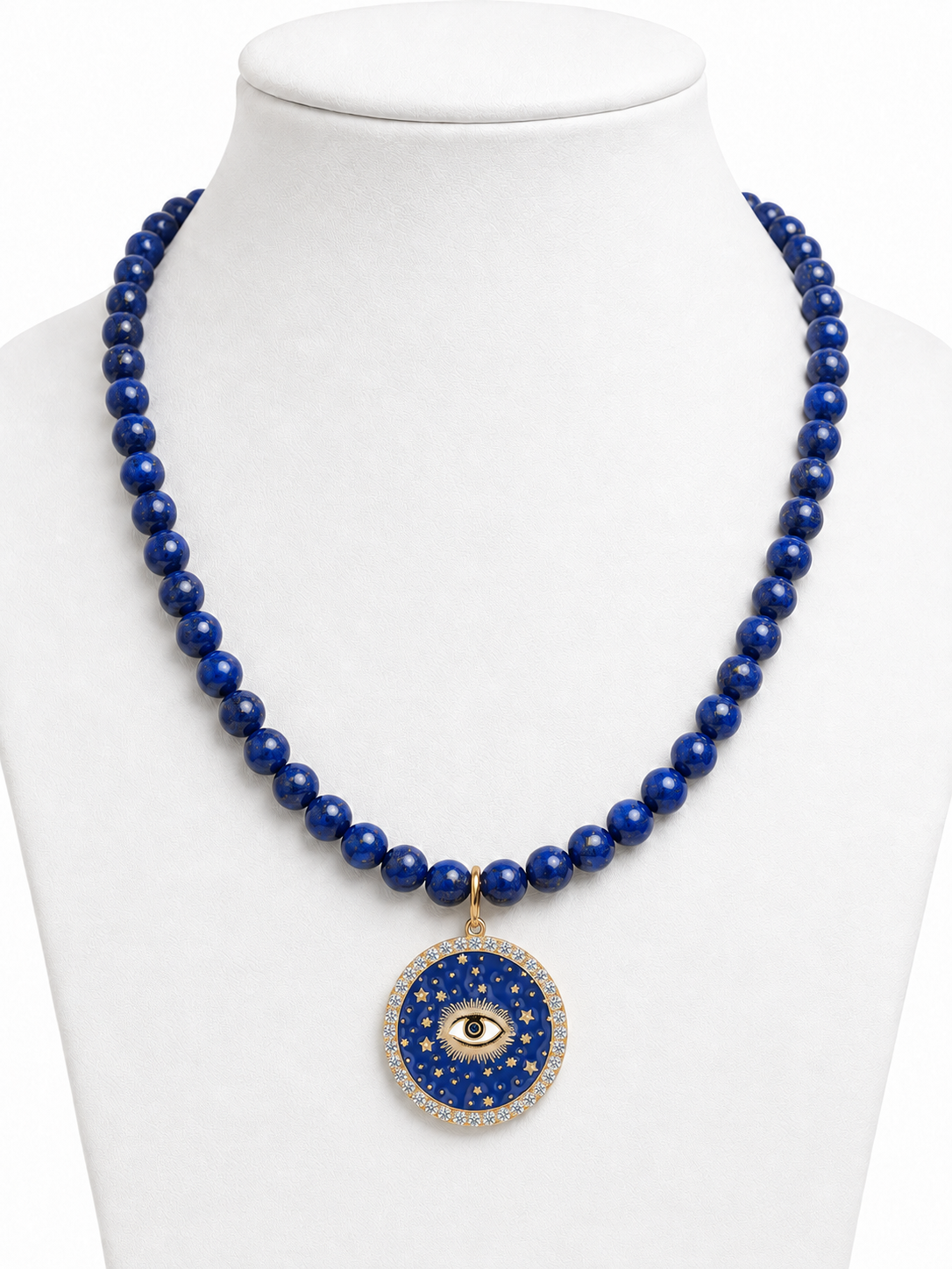 Lapis Lazuli Evil Eye Protection Necklace on jewelry bust showing full deep blue gemstone beaded chain with gold evil eye coin pendant.